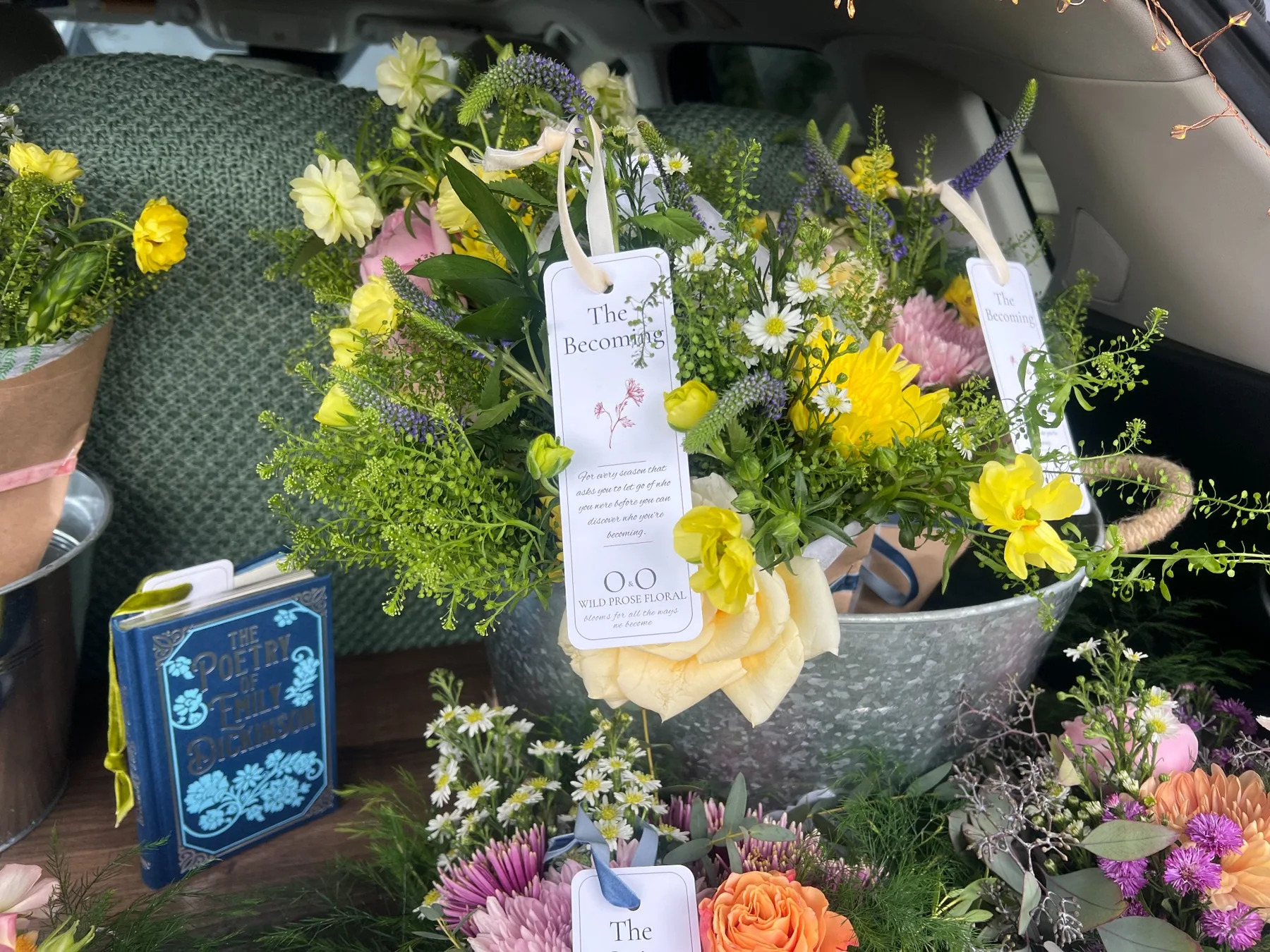 The Becoming bouquets with signature bookmarks