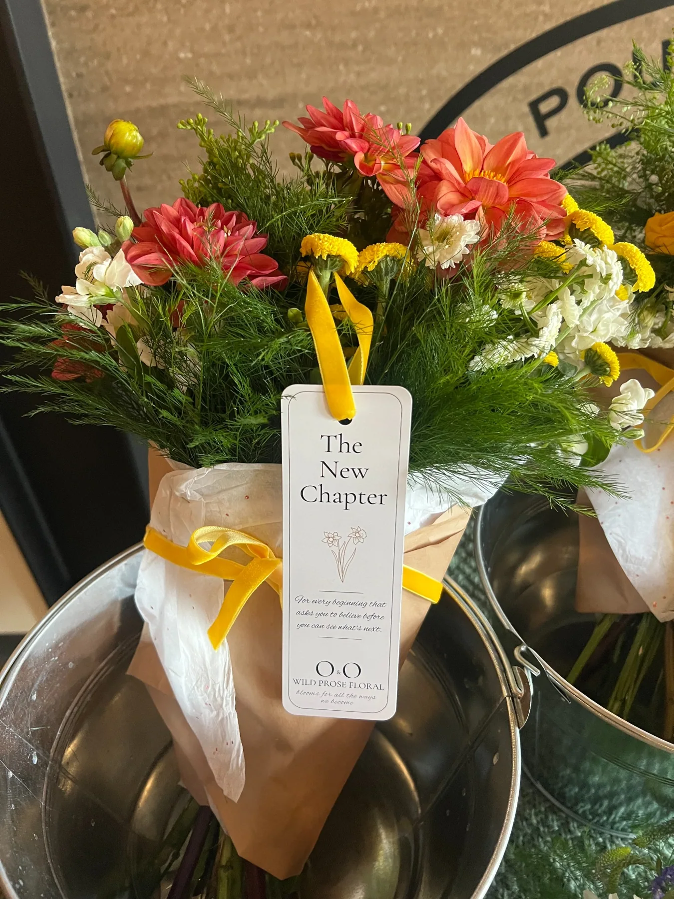 The New Chapter bouquet with yellow velvet ribbon